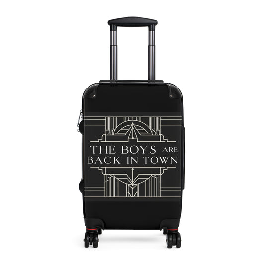 Stylish Black Suitcase with 'The Boys Are Back in Town' Design