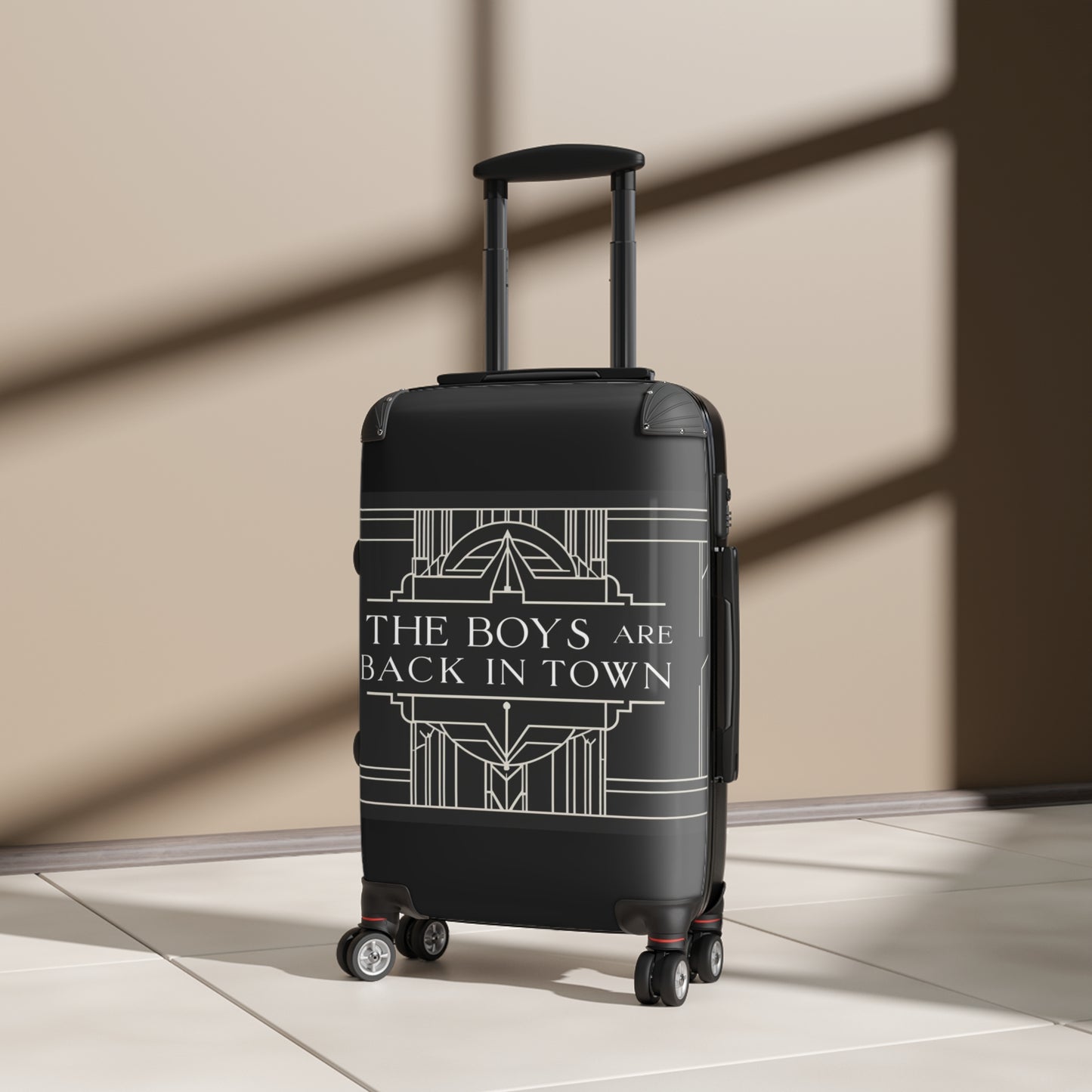 Stylish Black Suitcase with 'The Boys Are Back in Town' Design